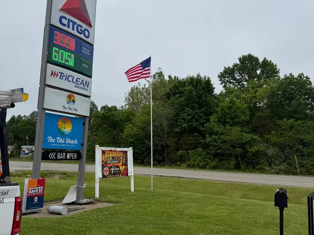 Flagpole at a roadside service station in Indiana flying the national flag